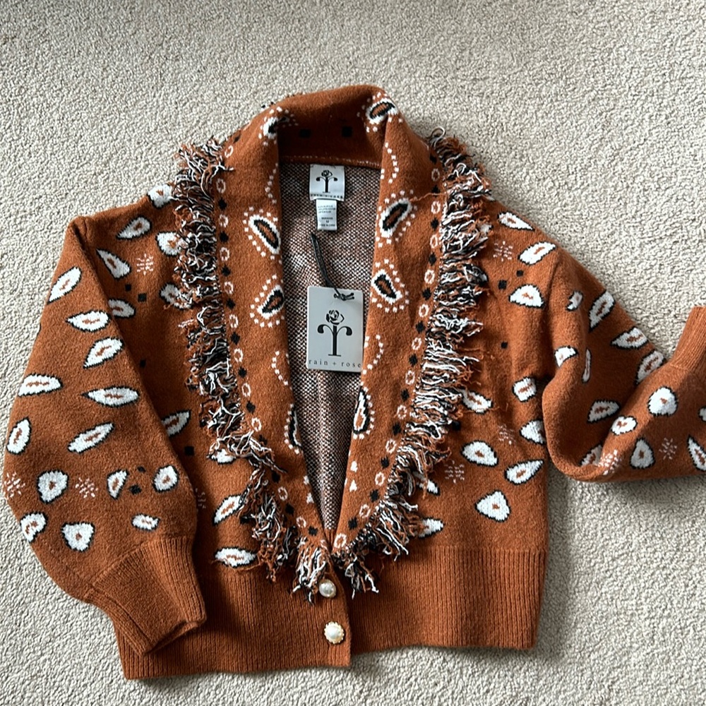 Rain + Rose rust fringed sweater NWT in size M. This unique sweater is warm&cozy